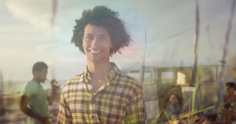 Smiling Man Enjoying Beach Day with Friends