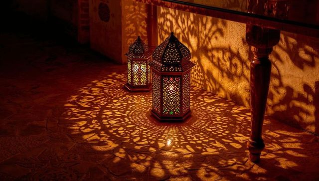 Moroccan lanterns casting intricate lace shadows on warm tiled floor