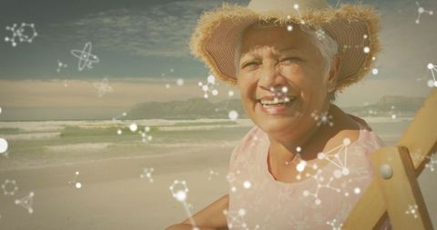 Elderly Woman Relaxing in Straw Hat by Sea with Digital Elements