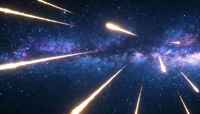 Racing meteor shower across milky way night sky with shooting star streaks and purple nebula
