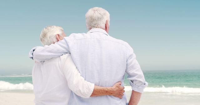 Senior Couple Embracing on Beach by the Sea - Download Free Stock Images Pikwizard.com