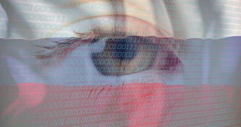 Serene woman reclining on bed with binary code overlay and soft sunlight