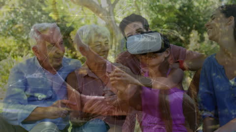 Multigenerational Family Enjoying Virtual Reality Outdoors