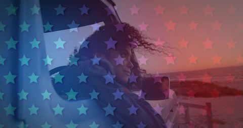Contemplative Woman in Car with Patriotic Overlay at Sunset