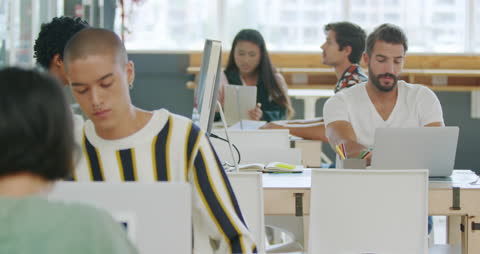 Diverse Creative Professionals Working in Modern Open Office