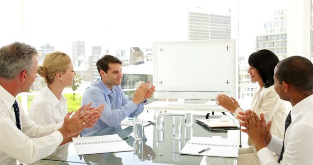 Business Team Applauding During Meeting in Modern Office - Download Free Stock Images Pikwizard.com