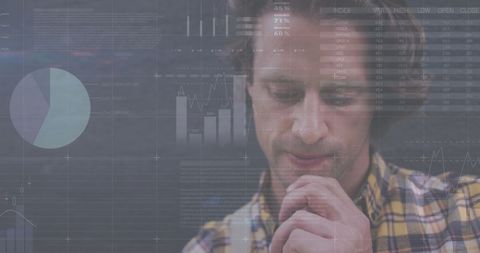 Contemplative Man Analyzing Financial Data Charts