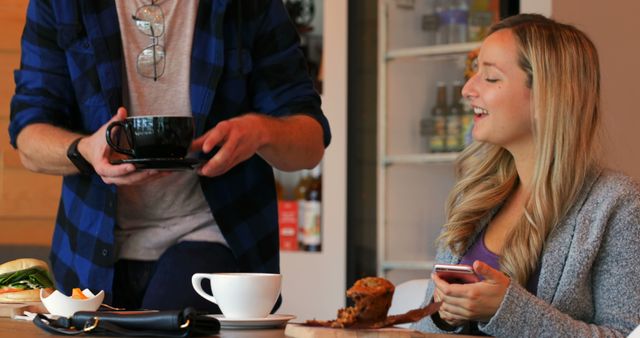 Woman Enjoying Coffee Break with Friend in Café - Download Free Stock Images Pikwizard.com