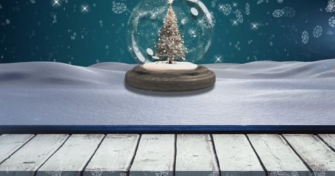 Snow Globe Tree with Falling Snow and Blue Background for Christmas