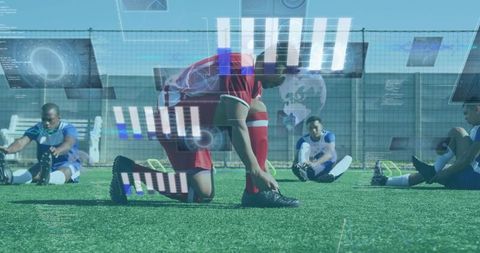 Soccer players tying cleats and stretching with performance hud overlay on training field