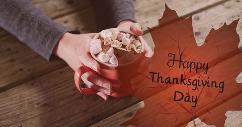 Cozy Thanksgiving Concept with Cocoa and Leaf Overlay