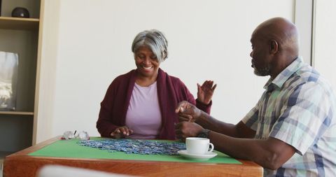 Senior Couple Enjoying Relaxing Puzzle Time at Home - Download Free Stock Images Pikwizard.com