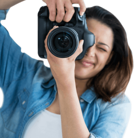 Young woman photographer with camera on transparent background