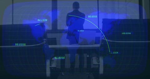 Chinese executive standing analyzing futuristic hud world map in control room