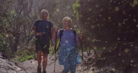 Active Senior Couple Hiking in Refreshing Forest Environment