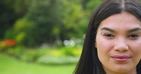 Serene Portrait of Mid Adult Woman in Lush Garden
