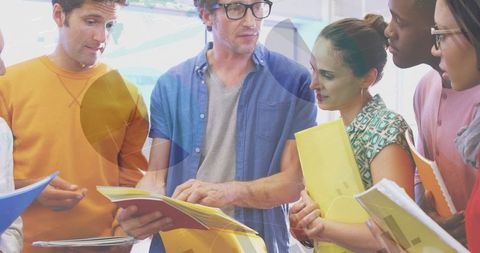 Diverse Business Team Collaborating on Digital Finances