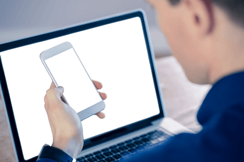 transparent smartphone and laptop focus in professional setting - Download Free Stock Videos Pikwizard.com