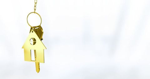 Golden House-Shaped Keychain Pendant with Keys on White Background - Download Free Stock Images Pikwizard.com