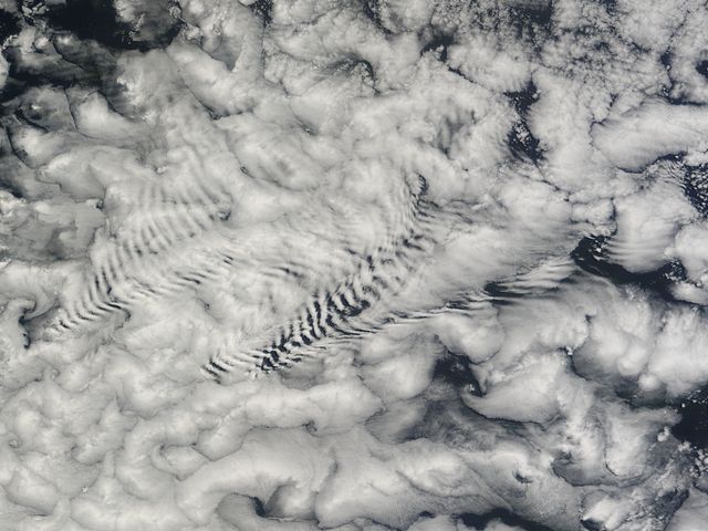 Ship-wave-shaped wave clouds induced by the Crozet Islands, south Indian Ocean - Download Free Stock Photos Pikwizard.com
