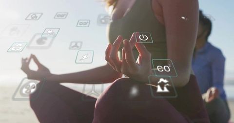 Woman Meditating on Beach with Floating Eco Icons