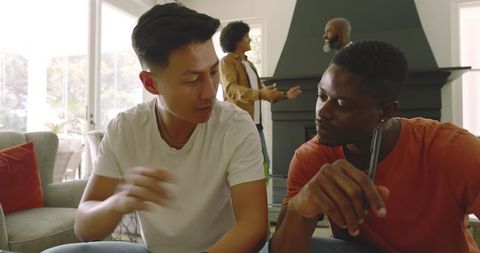 Multicultural Friends Bonding at Home During Social Gathering