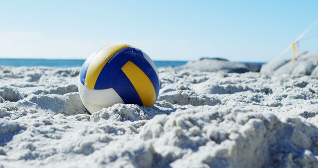 Volleyball Lying on Sandy Beach under Clear Blue Sky - Download Free Stock Images Pikwizard.com