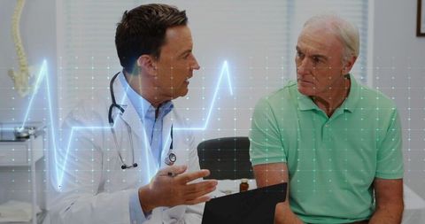 Doctor Discussing Health Data with Elderly Patient