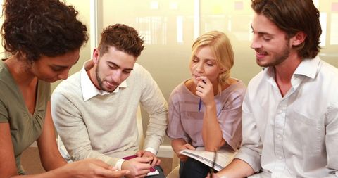 Diverse Group Collaborating in Professional Meeting - Download Free Stock Images Pikwizard.com