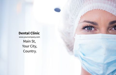 Confident Female Dentist Wearing Surgical Mask in Dental Clinic