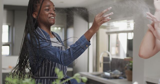 Woman Having Fun in Kitchen While Baking - Download Free Stock Images Pikwizard.com