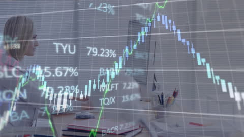 Financial Analyst Reviewing Stock Market Trends on Screen