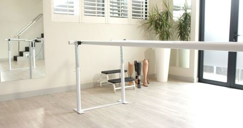 Rehabilitation Room with Adjustable Parallel Bars Near Prosthetics