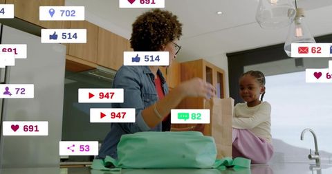 Preparing lunch in modern kitchen with child watching and social media engagement overlays