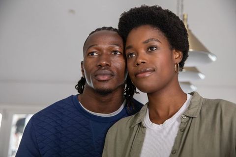 Intimate Moment of African American Couple Contemplating Together at Home