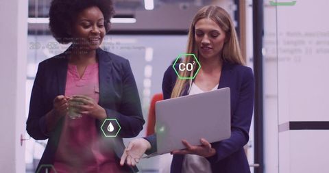 Diverse Colleagues Analyzing Data with Modern Technology Overlays