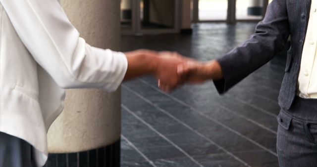 Professional handshake in modern business environment - Download Free Stock Images Pikwizard.com