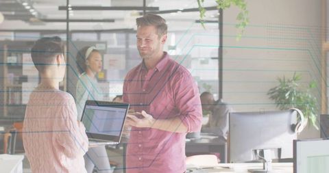 Focused Professionals Collaborating in Modern Office Environment