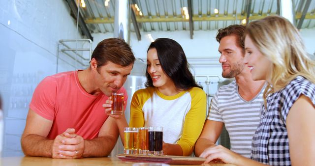 Friends Enjoying Casual Day at Brewery Tasting Varieties of Beer - Download Free Stock Images Pikwizard.com