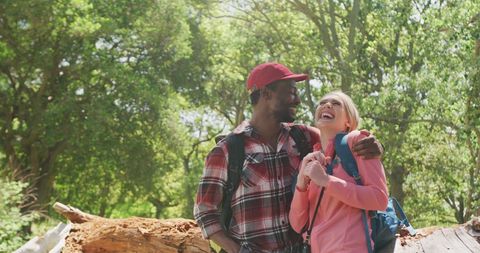 Happy Diverse Couple Enjoying Nature on Sunny Day