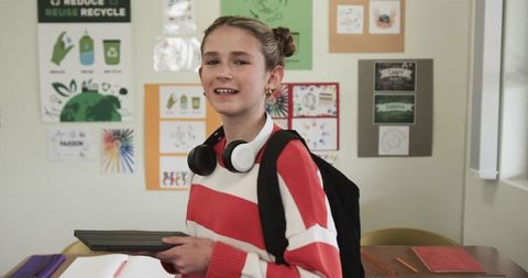 Student championing technology and sustainability in classroom