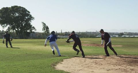 Diverse baseball players in dynamic first base competition