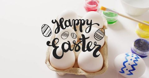 Happy easter greeting with painted eggs and colors