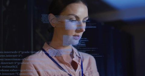 Female developer analyzing code overlay at tech conference wearing lanyard and badge
