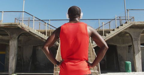 Athletic Man Listening to Music During Outdoor Workout - Download Free Stock Images Pikwizard.com