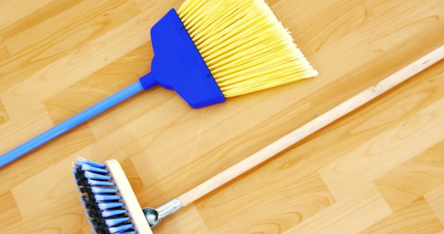 Cleaning Brooms on Hardwood Floor for Housekeeping and Maintenance - Download Free Stock Images Pikwizard.com