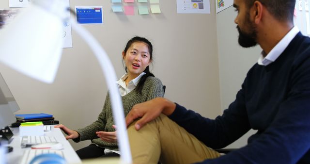 Colleagues Having a Discussion in a Modern Office Setting - Download Free Stock Images Pikwizard.com