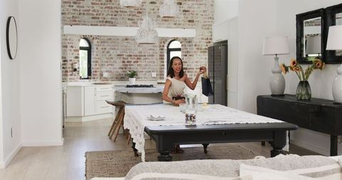 Stylish Kitchen Gathering with Friends Enjoying Together