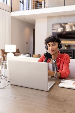 Tech-savvy broadcaster engaging audience from home