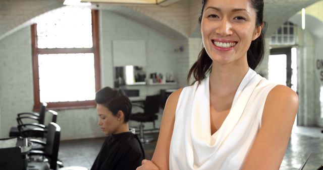 Confident Smiling Hair Stylist in Salon with Client Receiving Haircut - Download Free Stock Images Pikwizard.com